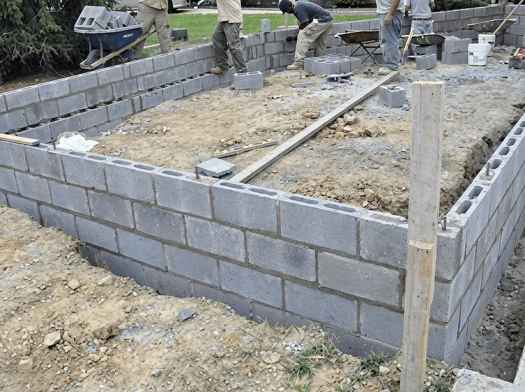 Professionals building a foundation with blocks in Phoenix, AZ