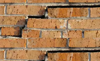 Brick wall with serious structural damage in Phoenix, AZ